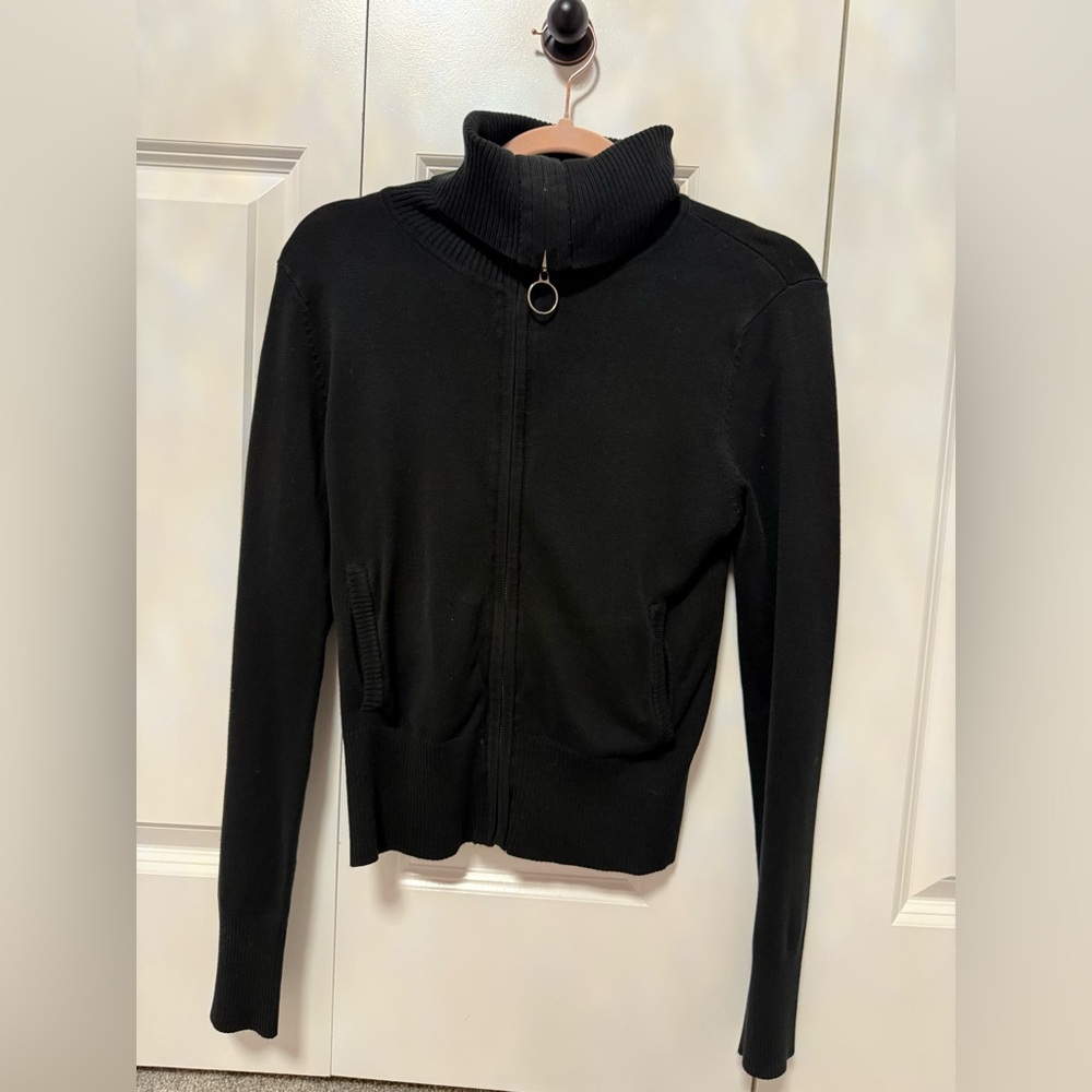 Girls black cowled turtle neck sweater. Zip up. Two pockets. Never worn!
